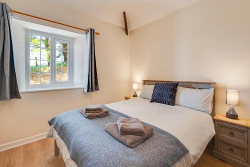 Voodi või voodid majutusasutuse Caer Ffynnon toas