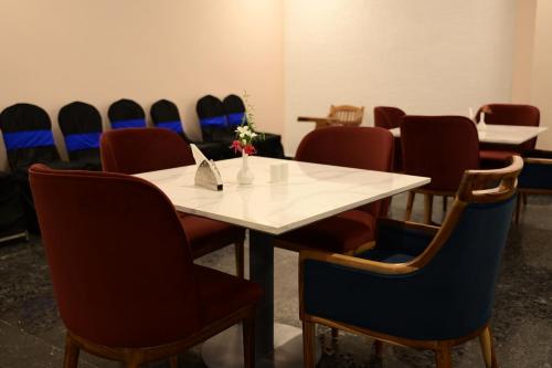 a conference room with a table and chairs at Pipul Ocean View Resort in Puri