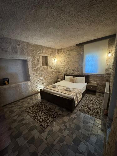 Postel nebo postele na pokoji v ubytování Panda Stone House