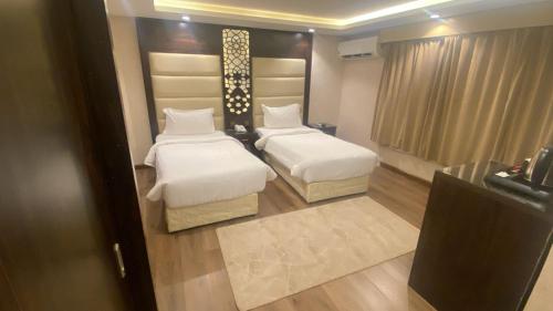 Cama o camas de una habitación en Sahary Al Ula Resort