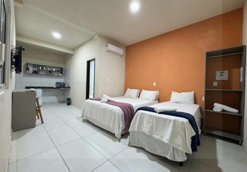 Ένα ή περισσότερα κρεβάτια σε δωμάτιο στο Flat Bela Vista