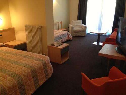 Hotel Delle Alpiにあるベッド