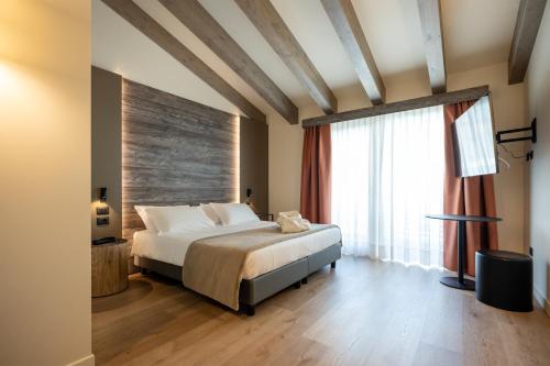 Hotel Delle Alpiにあるベッド