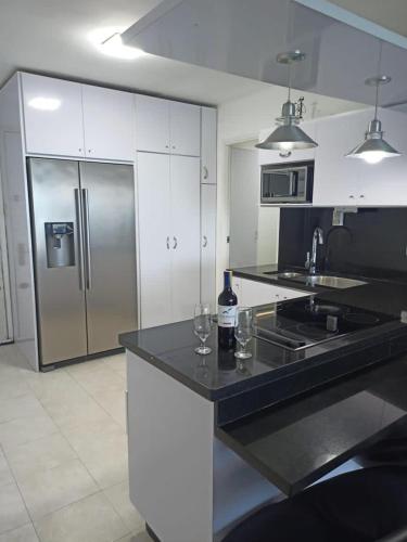 Η κουζίνα ή μικρή κουζίνα στο Bello Apartamento playa lido