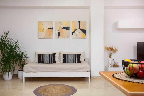 a bedroom with a bed with two pillows on it at Harmony home in Ierápetra