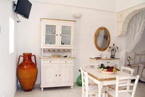 Una cocina o zona de cocina en Il Pumo Dorato