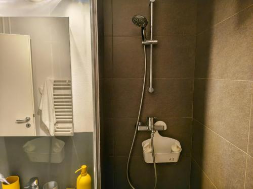 Ένα μπάνιο στο Ospitalier Apartments Student