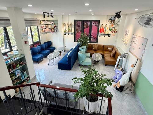 an overhead view of a living room with a couch at Snu Motel - Cao Bằng in Cao Bằng