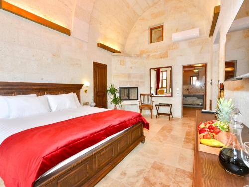 Ένα ή περισσότερα κρεβάτια σε δωμάτιο στο Evanthia Cave Suites - Special Class