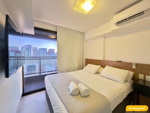 a bedroom with a bed with two white pillows at Landscape melhores apartamentos da Beira Mar in Fortaleza