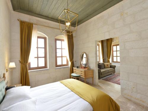 Ένα ή περισσότερα κρεβάτια σε δωμάτιο στο Evanthia Cave Suites - Special Class