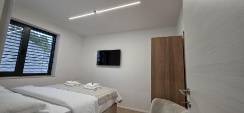 Cama o camas de una habitación en Aupark Apartments