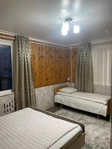 Ένα ή περισσότερα κρεβάτια σε δωμάτιο στο ToodoResort