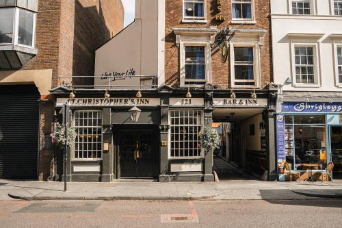 a store on a street in a city at St Christopher's Inn London Bridge - The Inn in London