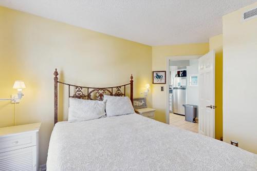 Ένα ή περισσότερα κρεβάτια σε δωμάτιο στο St Regis Condo Unit 2514