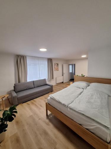 Кровать или кровати в номере City Apartment