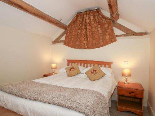 Postel nebo postele na pokoji v ubytování Millstone Cottages - Millstone Cottage