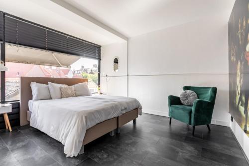 Postel nebo postele na pokoji v ubytování rembrandtsbeachsuite