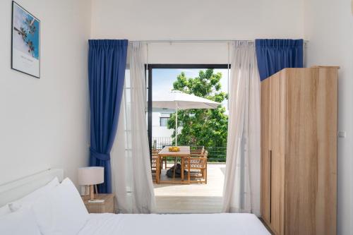 Ένα ή περισσότερα κρεβάτια σε δωμάτιο στο Laguna Park 10 minutes walk to Bangtao Beach