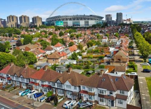 an aerial view of a suburb with a stadium at Stylish 1BR Apartment Wembley Stadium Sleeps 4 in London