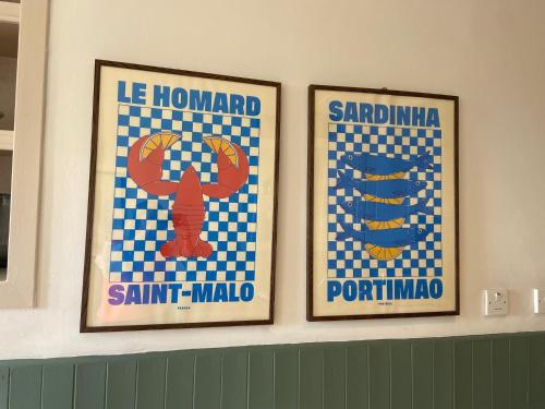 three framed pictures of santa mola on a wall at Kirkmay 4 in Crail