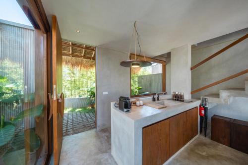 Kuchyň nebo kuchyňský kout v ubytování Mizu Homes By Avanterra