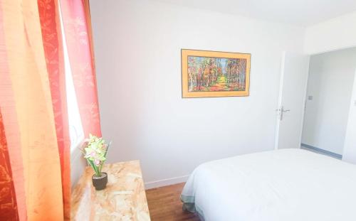 Cama o camas de una habitación en Agréable et Calme