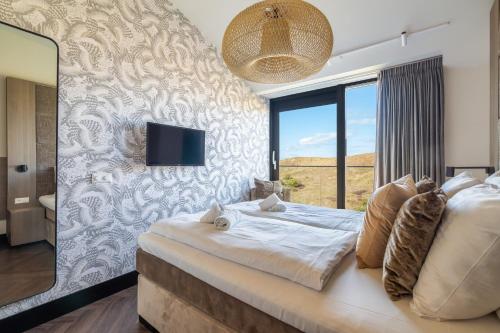 Ένα ή περισσότερα κρεβάτια σε δωμάτιο στο Residence Westduin