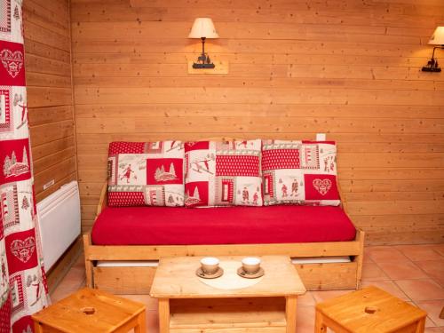 En eller flere senge i et værelse på Appartement 3 pièces 8 personnes avec parking ; animaux admis - FR-1-504-189