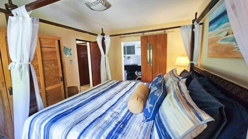Ein Bett oder Betten in einem Zimmer der Unterkunft Aruba Beach Front