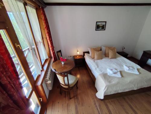 Postel nebo postele na pokoji v ubytování Mountain View ECOVILLA