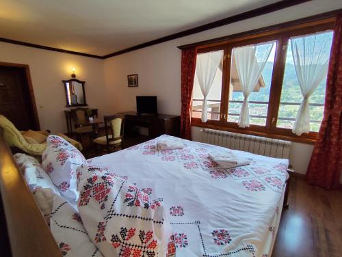 Postel nebo postele na pokoji v ubytování Mountain View ECOVILLA