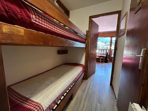 Ένα ή περισσότερα κρεβάτια σε δωμάτιο στο Résidence 2-235 - Proche centre village