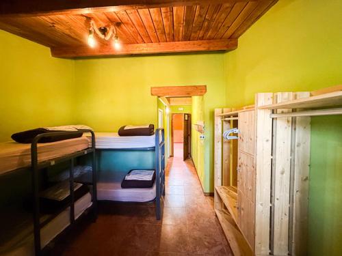 Postel nebo postele na pokoji v ubytování Albergue Turístico El Campelín