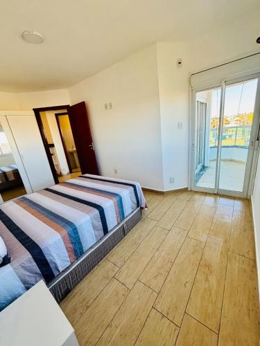 Postel nebo postele na pokoji v ubytování Rio Grande apartmento Av primeiro de Maio 820 apartment 301