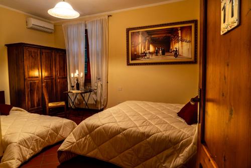 Ένα ή περισσότερα κρεβάτια σε δωμάτιο στο Agriturismo Marrucola