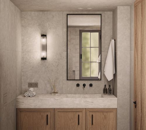 a bathroom with a sink and a mirror at Elion Villas in Kos Town