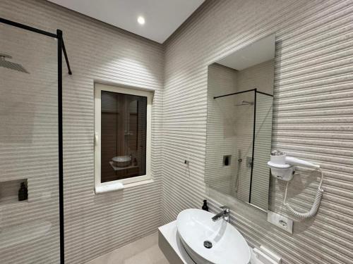 Koupelna v ubytování Hotel Vila Zeus