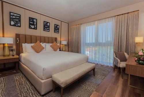 Postel nebo postele na pokoji v ubytování InterContinental Lusaka by IHG