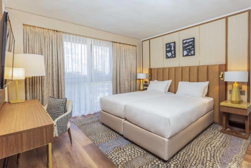 Postel nebo postele na pokoji v ubytování InterContinental Lusaka by IHG
