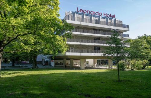 a building with a sign that reads leonardo hotel at Leonardo Hotel Hannover in Hannover
