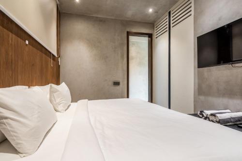 Ένα ή περισσότερα κρεβάτια σε δωμάτιο στο Jungle Vista Hotel Ubud Bali