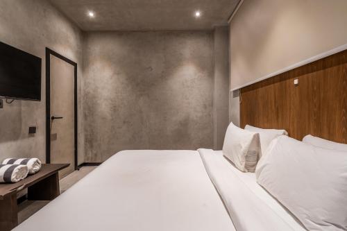 Ένα ή περισσότερα κρεβάτια σε δωμάτιο στο Jungle Vista Hotel Ubud Bali