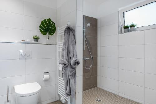 Ένα μπάνιο στο Ferienwohnung Strandperle, App 3 Olpenitz