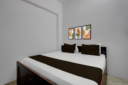 Ένα ή περισσότερα κρεβάτια σε δωμάτιο στο SPOT ON RED DIAMOND HOTEL & SWEET RESTAURANT