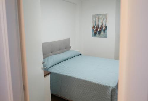 Postel nebo postele na pokoji v ubytování indipendenza 60 Home Como Center