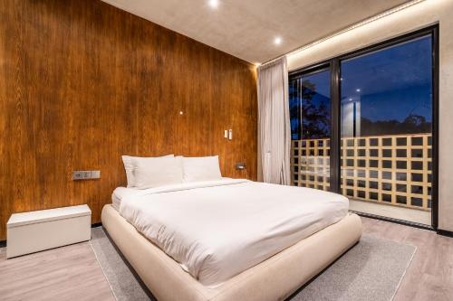 Ένα ή περισσότερα κρεβάτια σε δωμάτιο στο Jungle Vista Hotel Ubud Bali