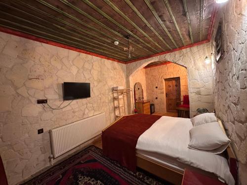 Ein Bett oder Betten in einem Zimmer der Unterkunft Kale House Nar