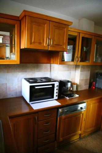 Kuchyň nebo kuchyňský kout v ubytování Mountain View ECOVILLA