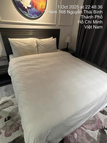 Ένα ή περισσότερα κρεβάτια σε δωμάτιο στο Kinh Uio Tex Hotel 6